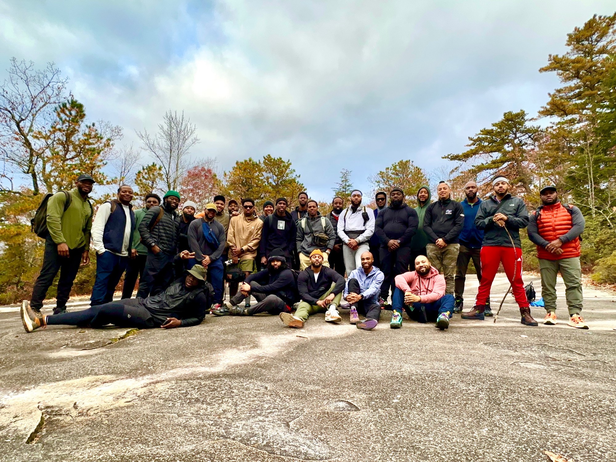 Members of The Healing gathered outdoors
